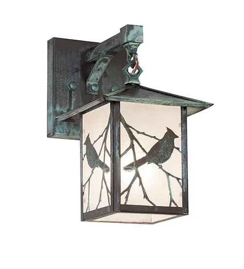 You can almost hear this singing bird's beautiful melodies echoing the rhythms of Mother Nature. Delicately etched in Solid Brass; the delicate songbird silhouettes perched on branches accentuate this charming wall sconce. The Solid Wall Sconce is finished in Verdigris and features a Frosted Seeded Glass diffuser. This left- oriented fixture complements the Stillwater Song Bird Left Wall Sconce; model 94177. These wall fixtures are perfect for illuminating indoor and outdoor spaces in timber homes; modern farmhouses; and other locations. The Stillwater Song Bird Wall Sconces are included in our American-made; American-designed; handcrafted Craftsman Signature Lighting Collection and manufactured in Yorkville; New York. UL and cUL listed for dry; damp; and wet locations. Our Build Your Own Craftsman Signature Series features unlimited combinations of styles. The collection is called Build Your Own because it is fully configurable and customizable from size and design to finish and lens color. Go wild with the options; or send us your own concept today! Call today to learn how to use the configuration tool available on our website for an instant item number! - alternate view