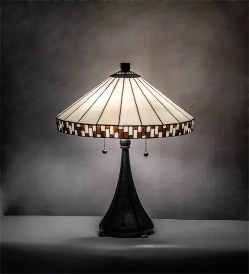 A delightful, illuminating accent piece for your home. Highlighted with a dazzling gridlike design in Beige and Green Glass accents on a Beige art glass background, this lamp art glass shade is enhanced with an elegant cast metal base and is hand finished in a warm Mahogany Bronze. The shade is created using the famous Meyda Tiffany copperfoil construction process. The Checkerboard Table Lamp is included in our American-designed, handcrafted Transitional Collection. UL and cUL listed for dry locations. Collection: Checkerboard Finish: Mahogany Bronze Glass: Bag Xag Bag Width: 18.00" Height: 21.75" Length: 18.00" Weight: 12.50 lb Number of Bulbs: 2 Maximum Wattage: 60.00 W Bulb Type: A19 Bulb Base: E26 Material: Zinc Country of Origin: CHINA Safety Listing: Dry Safety Rating: Dry