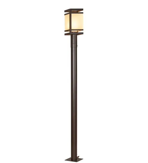 This impressive Panera post mount is custom-crafted with a geometrically styled shade sandwiched between platforms for a unique layered design statement. A Provostone Idalight shade is enhanced with hardware; decorative accents; and a frame featured in a Cafe Noir finish. Custom-made by expert artisans; this fixture is perfect for outdoor applications and can be mounted on posts and columns for decks; porches; patios; and other exterior spaces. The Panera Post Mount is included in our American-made; American- designed; handcrafted Modern Lighting Collection; manufactured in Yorkville; New York. The fixture is UL and cUL listed for use in dry; damp; and wet locations. It is featured in Panera Bread restaurants nationwide.