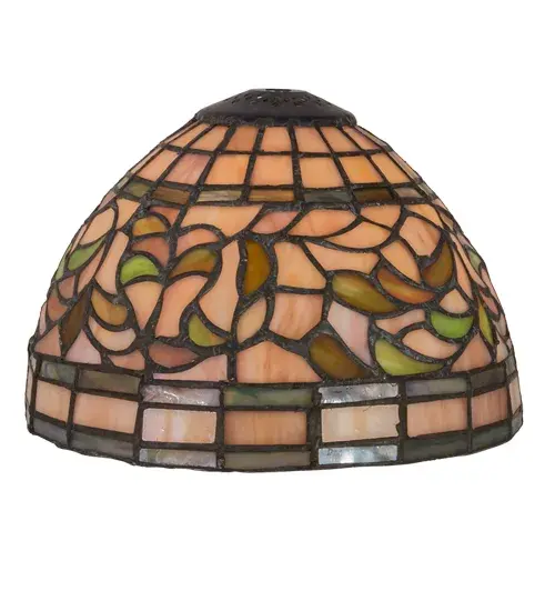 Subtle toned Autumn Gold; Russet and Moss Green leaves swirl against an Amber Mauve background in this Tiffany Studio stained glass reproduction. The shade is enhanced with bands of Purple; Blue and Green and created using the famous Meyda Tiffany copperfoil construction process. This shade can be used with hardware to create a fine ceiling fixture or a base to make a handsome table lamp. Every Meyda Tiffany item is a unique handcrafted work of art. Natural variations in the glass colors make every item a masterpiece of its own. - alternate view
