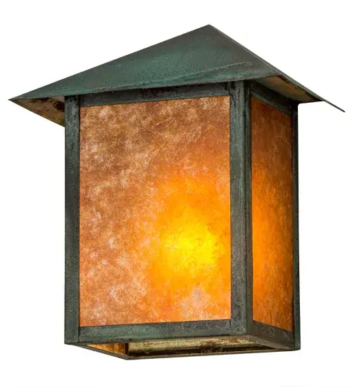 This Craftsman Signature lantern features stunning Amber Mica and is enhanced by handsome hardware featured in a Verdigris finish. Custom crafted by the hands of highly skilled artisans in Yorkville, New York, this wall sconce is offered in custom colors, styles and sizes as well as dimmable energy efficient lamping options such as LED. Although the wall fixture is UL and cUL listed for wet locations, we do not recommend it for use in constant high wind conditions. Collection: Seneca Finish: Verdigris Glass: Amber Mica Width: 9.25" Height: 11.00" Length: 5.50" Weight: 3.00 lb Extension from Wall: 5.50" Number of Bulbs: 1 Maximum Wattage: 60.00 W Bulb Type: A19 Bulb Base: E26 Country of Origin: USA Safety Listing: Damp Safety Rating: Damp