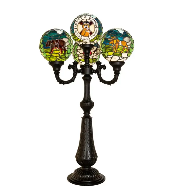 Every Meyda Tiffany item is a unique handcrafted work of art. Natural variations in the wide array of materials that we use to create each Meyda product make every item a masterpiece of its own. Photographs are a general representation of the product. Colors and designs will vary. Collection: Personalized Finish: Solar Black Glass: Stained Glass Width: 24.00" Height: 41.00" Length: 24.00" Weight: 34.50 lb Number of Bulbs: 4 Maximum Wattage: 60.00 W Bulb Type: A19 Bulb Base: E26 Material: Zinc/Steel/Brass/Polyresin Country of Origin: USA Safety Rating: Dry