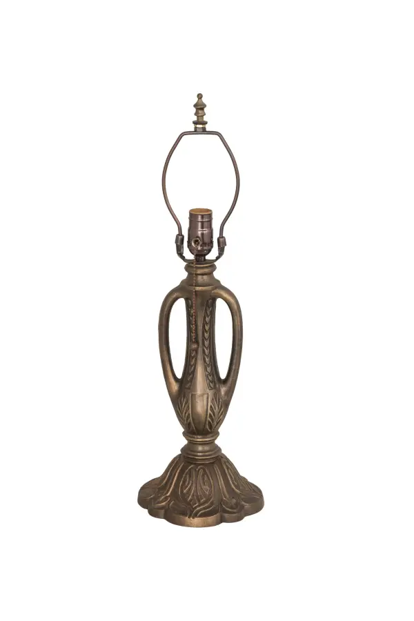 Every Meyda Tiffany item is a unique handcrafted work of art. Natural variations in the wide array of materials that we use to create each Meyda product make every item a masterpiece of its own. Photographs are a general representation of the product. Colors and designs will vary. Collection: Table Base Finish: Vintage Copper Glass: Beige Width: 7.00" Height: 14.00" Length: 7.00" Weight: 6.00 lb Number of Bulbs: 1 Maximum Wattage: 60.00 W Bulb Type: A19 Bulb Base: E26 Material: Zinc Country of Origin: USA Safety Listing: Dry Safety Rating: Dry