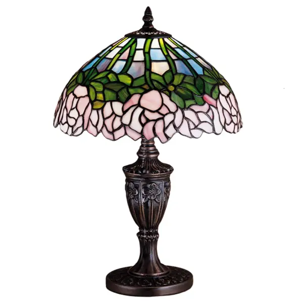 A wreath of full blooming Passion Pink cabbage roses circle this beautiful stained glass shade in a design inspired by the Louis Comfort Tiffany studio. Bronzed Green leaves and stems form a pattern against an Opal sky in this lovely Mahogany Bronze finished accent lamp.