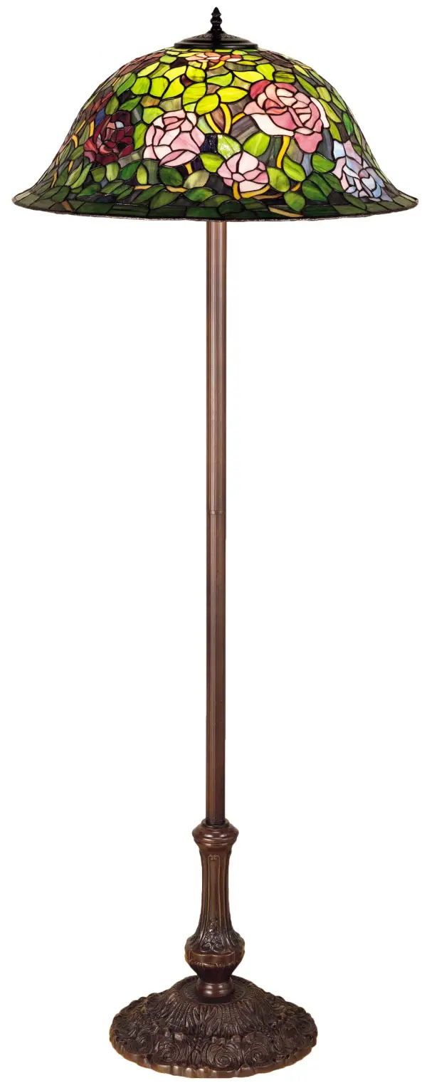 The most beloved of all flowers; the rose; is beautifully represented in this Meyda reproduction of a Tiffany Studio classic. Petal Pink; Romantic Red and Plum Passion art glass roses ramble on a maze of Garden Green leaves. The delicate domed stained glass shade is paired with a graceful; hand finished Mahogany Bronze floor lamp.