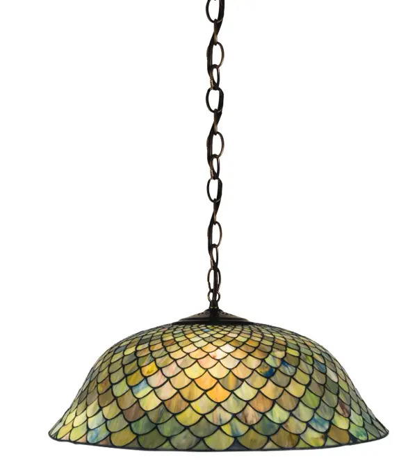 A Louis Comfort Tiffany studio classic fishscale pattern reproduced in variegated glass of Honey dripped Emerald, Sapphire, and Garnet. This handsome stained glass shade is used with Mahogany Bronze hand finished hardware. A versatile pendant to complement any color or style. Collection: Tiffany Fishscale Finish: Mahogany Bronze Glass: Stained Glass Width: 24.00" Height: 13.50" Length: 24.00" Weight: 11.00 lb Extension from Wall: 6.50" Number of Bulbs: 3 Maximum Wattage: 60.00 W Bulb Type: A19 Bulb Base: E26 Material: Metal Country of Origin: CHINA Safety Listing: Dry Safety Rating: Damp