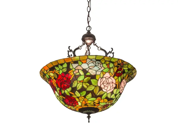 The most beloved of all flowers, the rose, is beautifully represented in this Meyda reproduction of a Tiffany Studio classic. Petal Pink, Romantic Red and Plum Passion art glass roses ramble on a maze of Garden Green leaves. The delicate domed stained glass shade is paired with a graceful, hand finished Mahogany Bronze inverted pendant fixture. Collection: Tiffany Rosebush Finish: Mahogany Bronze Glass: Stained Glass Width: 24.00" Height: 26.50" Length: 24.00" Weight: 12.50 lb Number of Bulbs: 3 Maximum Wattage: 60.00 W Bulb Type: A19 Bulb Base: E26 Material: Metal Country of Origin: CHINA Safety Listing: Damp Safety Rating: Damp