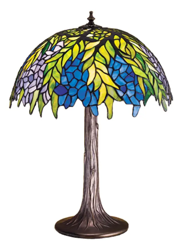 The Honey Locust was popular floral design created by Louis Comfort Tiffany; more than a century ago. Decorative dome-shaped stained glass lampshades; with petal shaped edges depict clusters of Plum and Periwinkle flowers amid Spring Green leaves cascading towards the base. This table lamp has a complementary decorative base featuring our Mahogany Bronze finish.