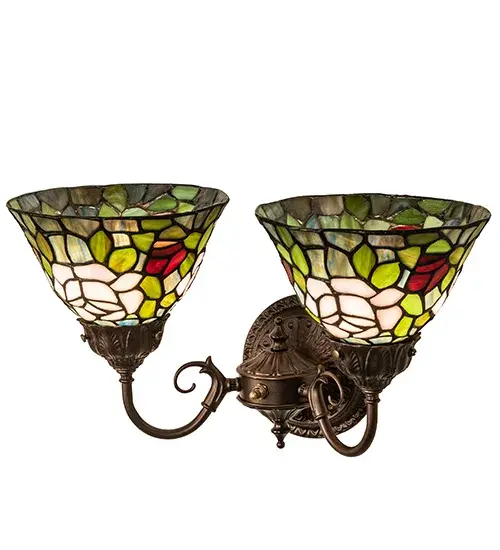 The most beloved of all floral beauties. The Rosebush 2-Light Wall Sconce is beautifully represented in this stunning reproduction of a Tiffany Studio Classic. Petal Pink and Romantic Red art glass Roses ramble on a maze of Garden Green leaves. The two stunning shades are created using the famous Meyda Tiffany copperfoil construction. The delicate domed stained glass shades are enhanced with a round backplate and scrolled arms in a warm Mahogany Bronze finish. UL and cUL listed for dry and damp locations. Collection: Tiffany Rosebush Finish: Mahogany Bronze Glass: Stained Glass Width: 17.00" Height: 10.00" Length: 9.50" Weight: 4.00 lb Extension from Wall: 10.00" Number of Bulbs: 2 Maximum Wattage: 60.00 W Bulb Type: G16 Bulb Base: E12 Material: Metal Country of Origin: CHINA Safety Listing: Dry Safety Rating: Damp - alternate view