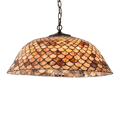 A Louis Comfort Tiffany studio classic. The famous Fishscale design features a variegated Tortoiseshell of Emerald, Sapphire, Mauve and Beige colored art glass, evoking a unique dimensional and textured look in a rainbow of brilliant hues. This exquisite art glass shade is created using the famous Meyda Tiffany copperfoil construction process. The shade is complemented with a Mahogany Bronze finish. The overall height ranges from 14 to 49 inches as the chain length can be easily adjusted in the field to accommodate your specific lighting application needs. UL and cUL listed for dry and damp locations. We cannot depict every color variation but if you are looking for a specific color, call customer service for an updated image. Collection: Tiffany Fishscale Finish: Mahogany Bronze Glass: Paba Width: 24.00" Height: 14.00" Length: 24.00" Weight: 12.00 lb Number of Bulbs: 3 Maximum Wattage: 60.00 W Bulb Type: A19 Bulb Base: E26 Material: Steel Country of Origin: CHINA Safety Rating: Damp - alternate view
