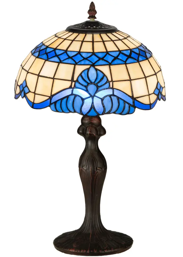 Regal scrolls of Royal Blue with coordinating diamonds; adorn this handsome Tiffany style; stained glass shade. The dome shade is paired with a coordinating accent lamp base; hand finished in Mahogany Bronze.