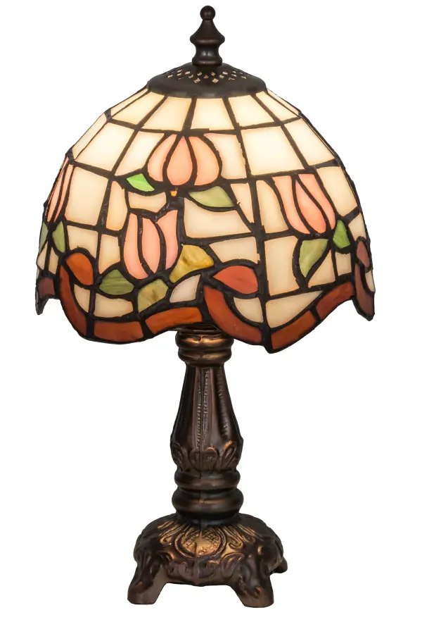Grace your home with this elegant crowned shade, featuring a gridwork of Opal Iridized glass, adorned with a Plum colored border of swirling ribbons and perfect Ice Pink rosebuds. The Tiffany style stained glass mini lamp is made of hand cut and copperfoiled glass and is paired with a Mahogany Bronze, hand finished lamp base. Collection: Roseborder Finish: Mahogany Bronze Glass: Stained Glass Width: 7.00" Height: 12.00" Length: 7.00" Weight: 2.00 lb Number of Bulbs: 1 Maximum Wattage: 60.00 W Bulb Type: G16 Bulb Base: E12 Material: Zinc Country of Origin: CHINA Safety Listing: Dry Safety Rating: Dry