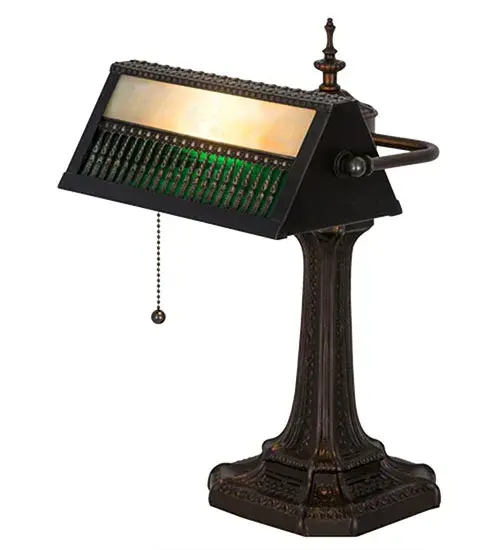 Beige and Emeralite Glass are combined to create this handsome Gothic Mission styled banker lamp. The lovely shade is embraced by an exquisitely designed base finished in Mahogany Bronze highlighted with Craftsman Brown. This elegant beauty will grace desks and tabletops for illumination to read by. The Gothic Mission Banker's Lamp is featured in our American made, American designed handcrafted Banker's Lamp Collection. Manufactured in Yorkville, New York. UL and cUL listed for dry locations. Collection: Gothic Finish: Craftsman Brown Highlighted Mahogany Bronze Glass: Beige & Green Art Glass Notes: Tube Bulb Width: 10.00" Height: 15.50" Length: 10.50" Weight: 7.50 lb Extension from Wall: 12.50" Number of Bulbs: 1 Maximum Wattage: 40.00 W Bulb Type: T10 Bulb Base: E26 Material: Steel/Brass Country of Origin: USA Safety Listing: Dry Safety Rating: Dry - alternate view