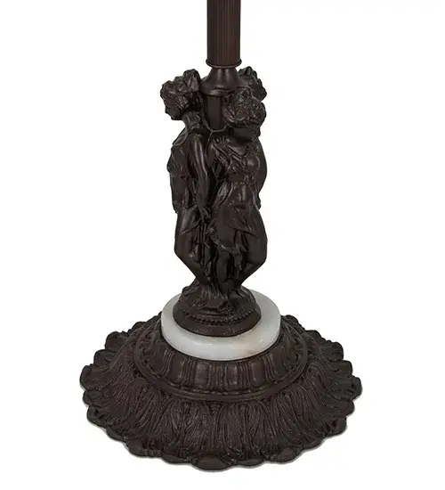 This slender floor base features intricate metal statuettes of three Greek goddesses _Aglaea (splendor); Euphrosyne (mirth); and Thalia (good cheer)_who embody charm; beauty; nature; human creativity; and fertility. Daughters of Zeus; they symbolize joy; youth; and the harmonious; intertwined nature of grace and beauty in art and life. The Mahogany Bronze decorative base features White Onyx accents and a bridge arm to embrace a single shade crafted from stained glass and other fine materials. The Three Graces Bridge Arm Floor Base is included in the American-Designed; handcrafted Decorative Floor Base collection. The base is UL and cUL listed for dry locations. - alternate view
