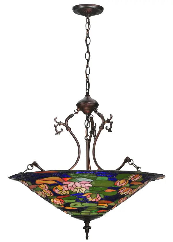 Flowering lilies and buds of Ivory kissed Petal Pink art glass rest on sun dappled Pond green lily pads in shimmering Tranquil Blue waters. This gracefully curved; exquisitely crafted version of a Tiffany Studio stained glass lamp shade rests in beautiful coordinating inverted pendant hardware; hand finished in a warm Mahogany Bronze.
