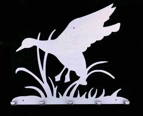 A Duck flies above cattails and marsh grasses on this wildlife inspired coat rack handcrafted in the USA by Meyda artisans. This rustic accessory has a handsome Pewter finish.