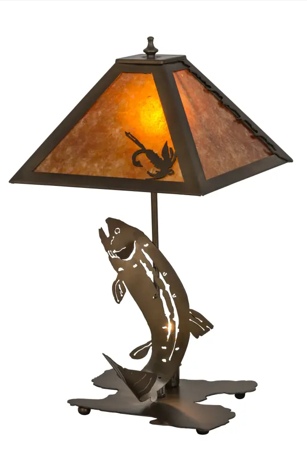This striking Trout is depicted leaping out of the water from a mountain lake, on a sculpted Trout base featured in an Antique Copper finish. Beautiful ambient light evokes from an Amber Mica shade, which is complemented with an alluring steel fishing accent. The shade is enhanced with a shade frame, hardware and accents featured in a matching finish. Handmade in the USA, this lamp is handcrafted in the Meyda manufacturing facility at the foothills of the Adirondack Mountain lake country. The lamp is available in custom colors, sizes, finishes and dimmable energy efficient lamping options such as LED. The lamp is UL and cUL listed for dry locations. Collection: Leaping Trout Finish: Antique Copper Antique Copper Glass: Amber Mica Width: 16.00" Height: 21.00" Length: 11.50" Weight: 4.50 lb Number of Bulbs: 1 Maximum Wattage: 25.00 W Bulb Type: B10 Bulb Base: E12 Material: Metal Or Polyresin Country of Origin: USA Safety Listing: Dry Safety Rating: Dry