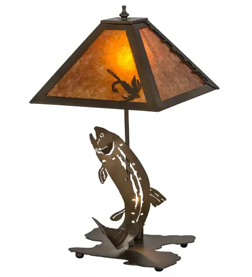 This striking Trout is depicted leaping out of the water from a mountain lake, on a sculpted Trout base featured in an Antique Copper finish. Beautiful ambient light evokes from an Amber Mica shade, which is complemented with an alluring steel fishing accent. The shade is enhanced with a shade frame, hardware and accents featured in a matching finish. Handmade in the USA, this lamp is handcrafted in the Meyda manufacturing facility at the foothills of the Adirondack Mountain lake country. The lamp is available in custom colors, sizes, finishes and dimmable energy efficient lamping options such as LED. The lamp is UL and cUL listed for dry locations. Collection: Leaping Trout Finish: Antique Copper Antique Copper Glass: Amber Mica Width: 16.00" Height: 21.00" Length: 11.50" Weight: 4.50 lb Number of Bulbs: 1 Maximum Wattage: 25.00 W Bulb Type: B10 Bulb Base: E12 Material: Metal Or Polyresin Country of Origin: USA Safety Listing: Dry Safety Rating: Dry - alternate view