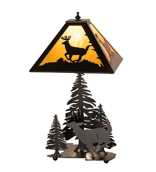 A leaping Deer accents a linear square shade that sits above a Deer running through a pine forest. The nature inspired table lamp lamp is finished in Black; has Emerald Green art glass panels and is handcrafted in the USA by Meyda artisans. - alternate view