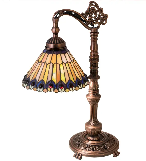 As distinctive as a beautiful Peacock fanning feathers in the wild; no two shades will ever be the same as their individuality can be as remarkably unique as their personality. This artistic creation utilizes swirling opalescent art glass background combinations including Beige; Yellow Pinks; Golden Greens; Ivories; Bluish Whites; Turquoise Blues; Olive and Spring Greens. The eye of the plumage design reveals Purples; Pastel Blues; Teals; Cobalt and Ivories; accented with Blue and Purple colored jewels. Individual pieces of glass are hand cut and wrapped using Meyda Tiffany's famous copperfoil construction. Each shade is a unique work of art with color variations based on natural ingredients inherent in the glass. Mahogany Bronze finish.