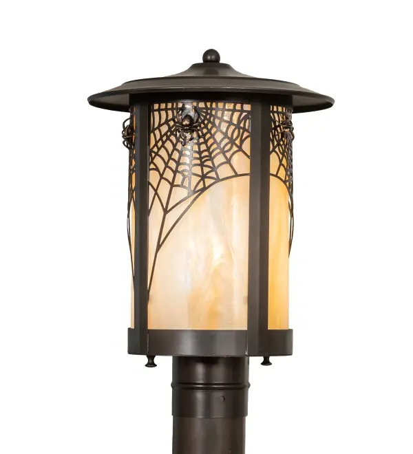 This stunning; graceful post-mount lighting fixture features a striking Spider Web design. The luminaire is handcrafted from Solid Brass; offering exquisite beauty for outdoor lighting applications. This stunning cylindrical lantern features a Beige Iridescent Glass lens; enhanced with a Craftsman Brown finish. The fixture is perfect for mounting on columns and posts on patios and decks in modern farm houses; cabins; and camps. The Fulton Spider Web Post Mount is part of our American-made; American-designed; handcrafted Craftsman Signature Series; manufactured in Yorkville; New York. UL and cUL are listed for use in both dry; damp; and wet locations. Our Build Your Own Craftsman Signature Series features unlimited combinations of styles. The collection is called Build Your Own because it is fully configurable and customizable from size and design to finish and lens color. Marine-grade; solid brass; or copper raw materials are utilized to ensure items from the Craftsman Signature Series of outdoor and indoor lighting will stand the test of time; as these premium metals are impervious to most types of oxidation. Hand-applied Patina finishes on brass and copper are sealed with a clear varnish and; over time; may require gentle maintenance; such as wax; to delay or reverse the natural living finish attributes indicative of this finishing process. Patina finishes on brass and copper provide strong resistance to fading from sun exposure; will not chip or crack; and will not rust like a steel-framed item in the same conditions. Choose from a variety of style options; or send us your concept today! Call today to learn how to use the configuration tool available on our website to generate an item number instantly.
