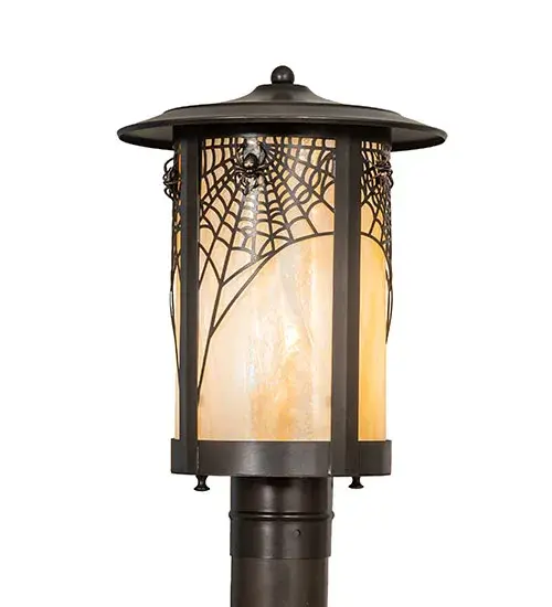 This stunning; graceful post-mount lighting fixture features a striking Spider Web design. The luminaire is handcrafted from Solid Brass; offering exquisite beauty for outdoor lighting applications. This stunning cylindrical lantern features a Beige Iridescent Glass lens; enhanced with a Craftsman Brown finish. The fixture is perfect for mounting on columns and posts on patios and decks in modern farm houses; cabins; and camps. The Fulton Spider Web Post Mount is part of our American-made; American-designed; handcrafted Craftsman Signature Series; manufactured in Yorkville; New York. UL and cUL are listed for use in both dry; damp; and wet locations. Our Build Your Own Craftsman Signature Series features unlimited combinations of styles. The collection is called Build Your Own because it is fully configurable and customizable from size and design to finish and lens color. Marine-grade; solid brass; or copper raw materials are utilized to ensure items from the Craftsman Signature Series of outdoor and indoor lighting will stand the test of time; as these premium metals are impervious to most types of oxidation. Hand-applied Patina finishes on brass and copper are sealed with a clear varnish and; over time; may require gentle maintenance; such as wax; to delay or reverse the natural living finish attributes indicative of this finishing process. Patina finishes on brass and copper provide strong resistance to fading from sun exposure; will not chip or crack; and will not rust like a steel-framed item in the same conditions. Choose from a variety of style options; or send us your concept today! Call today to learn how to use the configuration tool available on our website to generate an item number instantly. - alternate view