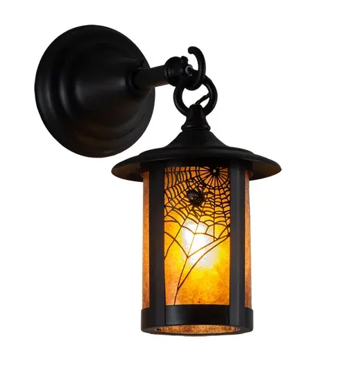Handcrafted from Solid Brass with alluring rustic beauty. This stunning Craftsman Signature lantern features a delightful Spider Web design on an Amber Mica diffuser enhanced with a Craftsman Brown finish. Display this wall sconce to illuminate the exterior of timber homes; modern farmhouses; and other spaces. The Fulton Spider Web Hanging Wall Sconce is featured in our American-made; American-designed; handcrafted Craftsman Signature Series; which is manufactured in Yorkville; New York. UL and cUL listed for dry; damp and wet locations. Our Build Your Own Craftsman Signature Series features unlimited combinations of styles. The collection is called Build Your Own because it is fully configurable and customizable from size and design to finish and lens color. Marine grade; solid brass; or copper raw materials are utilized to ensure items from the Craftsman Signature Series of outdoor and indoor lighting will stand the test of time; as these premium metals are impervious to most types of oxidation. Hand-applied Patina finishes on brass and copper are sealed with a clear varnish and; over time; may require gentle maintenance; such as wax; to delay or reverse the natural living finish attributes indicative of this finishing process. Patina finishes on brass and copper provide strong resistance to fading from sun exposure; will not chip or crack; and will not rust like a steel-framed item in the same conditions. Mica is less durable in outdoor locations but may be appropriate for mildly exposed areas. Choose from many style options; or send us your concept today! Call today to learn how to use the configuration tool available on our website for an instant item number! - alternate view