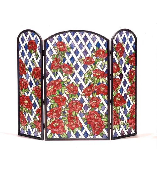 A Love for the Outdoors inspires this exquisite Meyda Original Fireplace Decor. A beautiful array of Red Roses in stained glass with glistening dew-kissed Green leaves against a Lavender and White Trellis brings sunny gardens into your home with this lovely handcrafted Tiffany-style fireplace screen. Illuminate the hearth of your home with gorgeous; custom-crafted stained glass fireplace screens that add a warm; cozy touch to any living space. This stunning adjustable fireplace screen is created using the famous Meyda Tiffany copperfoil construction technique. This gorgeous fireplace screen is handcrafted with two side panels that can be adjusted with the touch of a hand. The Rose Trellis Fireplace Screen is included in our American-designed; handcrafted Fireplace Decor Collection.