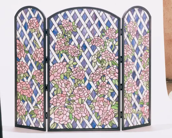 A Love for the Outdoors inspires this exquisite Meyda Original Fireplace Decor. A beautiful array of Pink Roses in stained glass with glistening dew-kissed Green leaves against a Lavender and White Trellis brings sunny gardens to your own home with this lovely handcrafted Tiffany-style fireplace screen. Illuminate the hearth of your home with gorgeous, custom-crafted stained glass fireplace screens that add a warm, cozy touch to any living space. This stunning adjustable fireplace screen is created using the famous Meyda Tiffany copperfoil construction technique and enhanced with a Black finished frame. This beautiful fireplace screen is handcrafted with two side panels that can be adjusted with the touch of a hand. The Rose Trellis Fireplace Screen is included in our American-designed, handcrafted Fireplace Decor Collection. Upstate New York's adventurous playland, known as the Adirondack Mountains, with its many breathtaking forests, lakes, and rivers, is the spiritual birthplace of Meyda and inspires our floral collections. Collection: Rose Trellis Finish: Craftsman Brown Glass: Pink Roses Width: 27.00" Height: 20.00" Weight: 24.00 lb Number of Bulbs: 4 Bulb Type: CA10 Bulb Base: Medium Material: Metal Country of Origin: CHINA Safety Listing: Dry Safety Rating: Dry