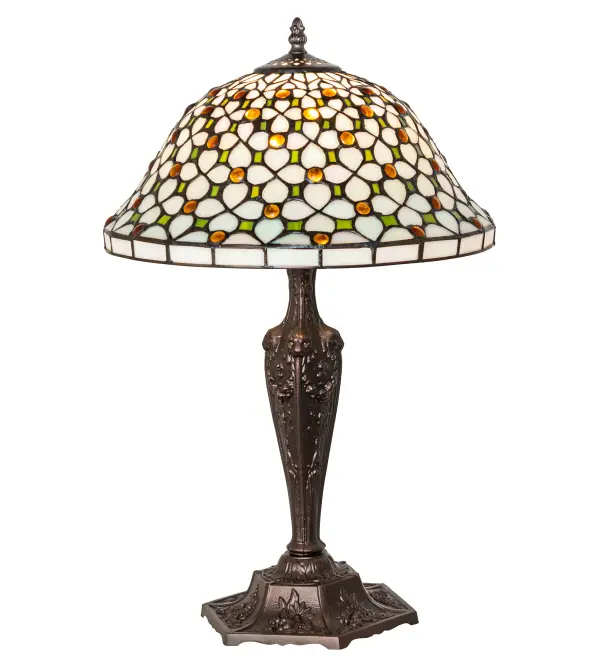 Diamond patterns of Iridized Ivory and Ivy Green are accented all over with sparkling clear jewels droplets in this elegant Victorian style shade. The versatile stained glass shade is created using copperfoil construction; a process developed by Louis Comfort Tiffany. The table lamp base is hand finished in a warm Mahogany Bronze.