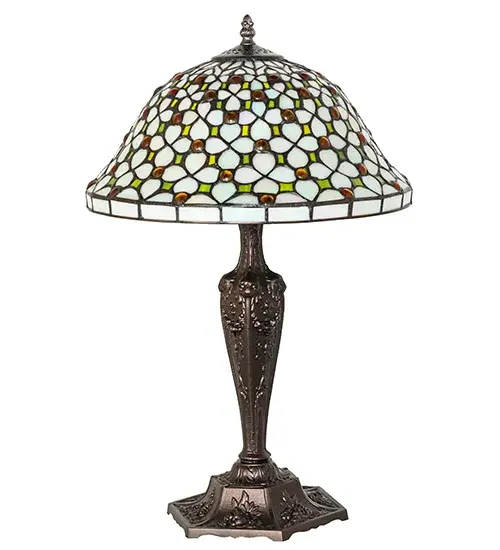 Diamond patterns of Iridized Ivory and Ivy Green are accented all over with sparkling clear jewels droplets in this elegant Victorian style shade. The versatile stained glass shade is created using copperfoil construction; a process developed by Louis Comfort Tiffany. The table lamp base is hand finished in a warm Mahogany Bronze. - alternate view