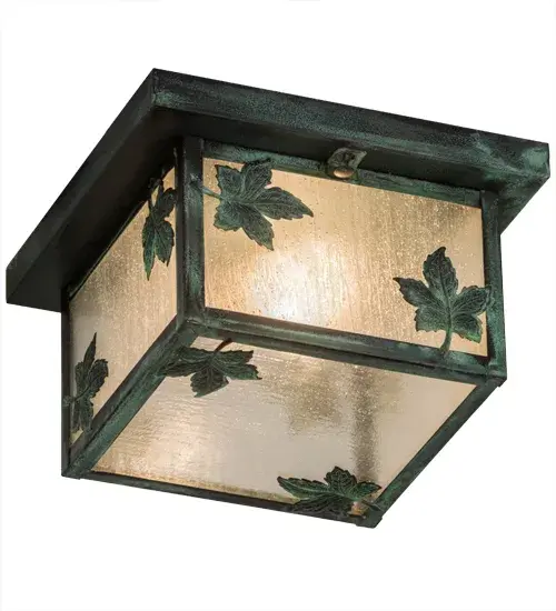 Falling Maple Leaves adorn this handsome American Craftsman style flushmount. The fixture, handcrafted in the USA by Meyda artisans, is finished in Verdigris and has Clear Seedy glass panels. Collection: Hyde Park Finish: Verdigris Glass: Clear Seeded Glass Width: 11.50" Height: 6.00" Length: 10.00" Weight: 5.00 lb Number of Bulbs: 1 Maximum Wattage: 60.00 W Bulb Type: A19 Bulb Base: E26 Country of Origin: USA Safety Listing: Damp Safety Rating: Wet - alternate view