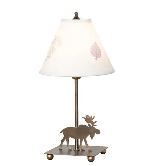 A nature inspired Moose accent lamp is topped with an Ivory paper shade with pressed flowers. The table lamp is finished in Antique Copper and is handcrafted in the USA by Meyda artisans. - alternate view