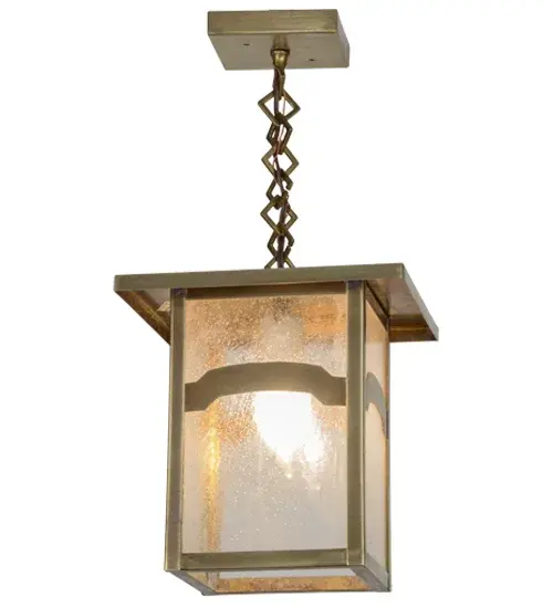 Handcrafted of Solid Brass; an abstract mountainside design comes to light with this Craftsman Signature lantern. This striking fixture features a Clear Seeded Glass diffuser with hardware featured in a Natural Brass finish. Ideal for indoor and outdoor applications. Made in the USA. Handcrafted by Meyda artisans in our Yorkville; New York manufacturing facility at the foothills of the Adirondack Mountains.