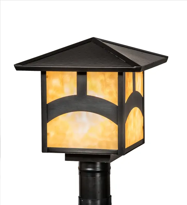 An Arts and Crafts Hill Top arched bar accents this handsome American Craftsman lantern style post mount. The fixture, handcrafted in the USA by Meyda artisans, is finished in Craftsman Brown and has Beige glass panels. Collection: Seneca Finish: Craftsman Brown Glass: Beige Art Glass Width: 17.00" Height: 13.00" Length: 12.00" Weight: 9.00 lb Extension from Wall: 5.00" Number of Bulbs: 1 Maximum Wattage: 60.00 W Bulb Type: A19 Bulb Base: E26 Material: Brass Country of Origin: USA Safety Listing: Wet Safety Rating: Wet
