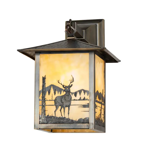 A young buck deer is depicted on this handsome American Craftsman lantern style hanging wall sconce. The fixture; handcrafted in the USA by Meyda artisans; has an Antique finish and has Beige glass panels.