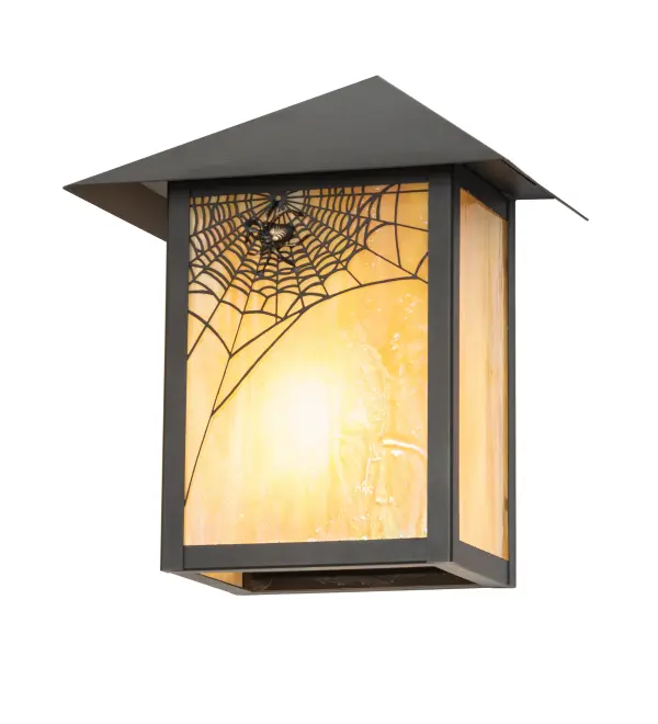 A Spider weaves it's magical web on the edge of this handsome American Craftsman lantern style wall sconce. The fixture; handcrafted in the USA by Meyda artisans; is finished in Craftsman Brown and has Iridized Beige glass panels.