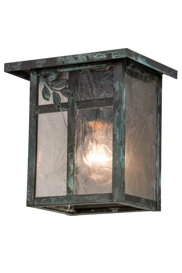 Crafted by hand from Solid Brass, a Single Branch Leaf filigree accent is highlighted on Clear Textured glass and complemented with hardware that is featured in a Verdigris finish. This Craftsman Signature fixture is perfect for indoor and outdoor lighting applications and handcrafted by Meyda artisans in the Yorkville, NY manufacturing facility at the foothills of the Adirondack Mountains. Custom colors, styles and sizes are available. Energy efficient lamping options are offered. Collection: Hyde Park Finish: Verdigris Glass: Clear Leaf Glass Width: 8.00" Height: 8.00" Length: 5.50" Weight: 3.50 lb Extension from Wall: 5.50" Number of Bulbs: 1 Maximum Wattage: 100.00 W Bulb Type: A19 Bulb Base: Medium Material: Zinc Country of Origin: USA Safety Listing: Wet Safety Rating: Wet