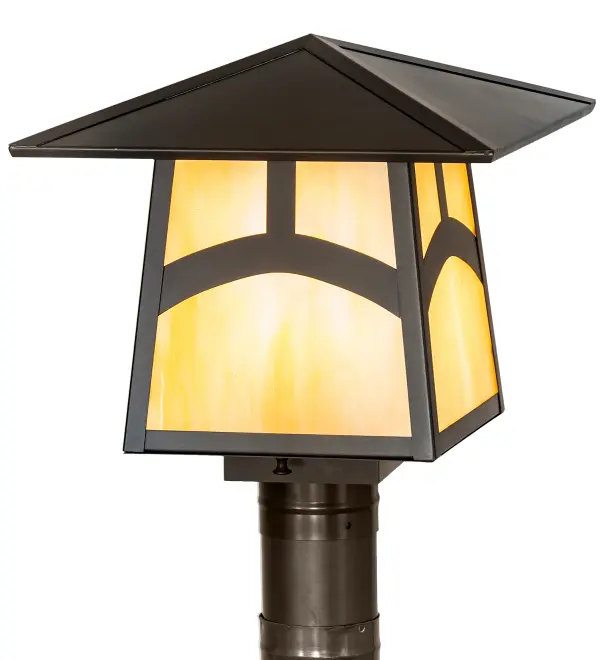An Arts and Crafts Hill Top arched bar accents this handsome American Craftsman lantern style post mount. The fixture; handcrafted in the USA by Meyda artisans; is finished in Craftsman Brown and has Beige glass panels.