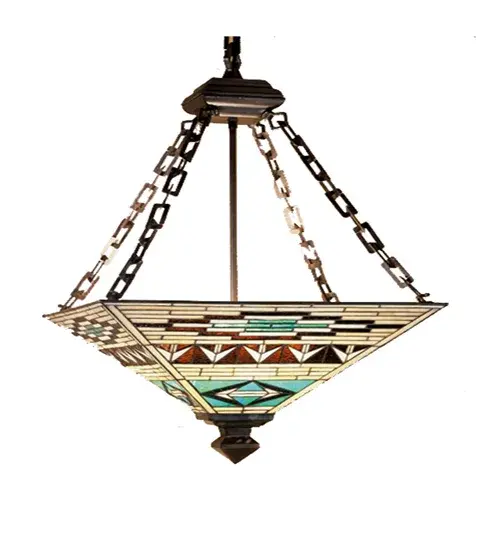 Patterns and colors of Native American blankets and pottery have given inspiration to this Meyda Tiffany designed Mission style stained glass shade. The intricately patterned shade of Bark Brown granite glass with Sand Beige and Turquoise is combined with clean lined Mission style inverted pendant hardware that has an earth toned Mahogany Bronze hand applied finish.