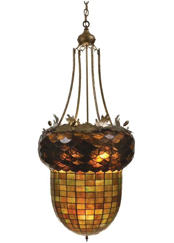 Majestic as the mighty oak is this leaf adorned inverted pendant in an antique copper finish. A lighted stained glass acorn, in multi toned Autumn Green with a Bark Brown granite glass crown sprouting oak leaf covered hardware that is hand made in the USA by Meyda Tiffany craftsmen. Collection: Greenbriar Oak Finish: Antique Copper Glass: Stained Glass Width: 22.00" Height: 54.50" Length: 22.00" Number of Bulbs: 3 Maximum Wattage: 60.00 W Bulb Base: E26 Material: Metal Country of Origin: USA Safety Listing: Damp Safety Rating: Damp