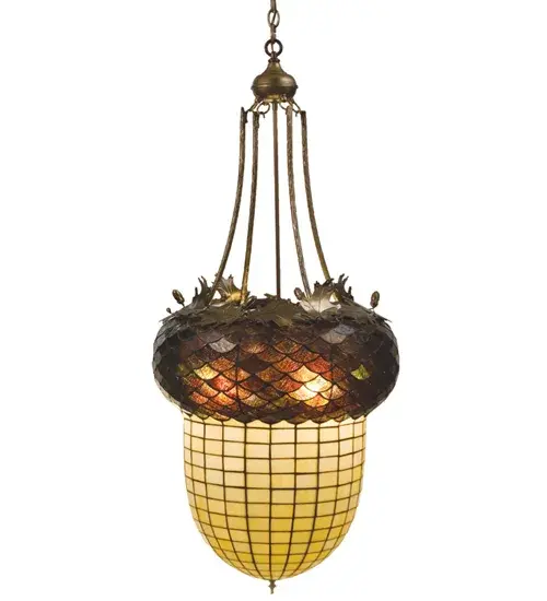 Majestic as the mighty oak is this leaf adorned inverted pendant in an antique copper finish. A lighted stained glass acorn, in Ivory with a multi-toned Bark Brown granite glass crown that sprouts oak leaf covered hardware that is hand made in the USA by Meyda Tiffany craftsmen. Collection: Greenbriar Oak Finish: Antique Copper Glass: Stained Glass Width: 22.00" Height: 54.50" Length: 22.00" Number of Bulbs: 3 Maximum Wattage: 60.00 W Bulb Base: E26 Material: Metal Country of Origin: USA Safety Listing: Damp Safety Rating: Damp