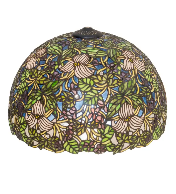 Nature abounds in this designer-styled stained glass shade. Glistening Red Glass Berries and clusters of Violets with Woodland Green leaves complement the delicate Ivory Trillium while Amber vines twist and turn through a background of Sky Blue and Clear Seeded glass. Clear Glass jewels glisten throughout the shade like the first dew drops of the day. This exquisite variegated shade is created with nearly 3;000 pieces of hand-cut stained glass using the famous Meyda Tiffany copperfoil construction process. The shade pairs well with a base to create a stunning lamp or is matched with hardware to build a beautiful ceiling fixture. The Trillium & Violet Shade is included in our American-designed; handcrafted Stained Glass Lighting Collection. Each shade is a unique work of art with color variations based on natural ingredients inherent in the glass. Please contact us if color matching is critical when ordering multiple items.