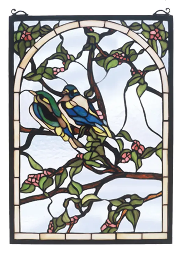 A Meyda original A pair of Teal and Sapphire lovebirds nest on branches of Bark Brown with Pink blossoms and Jade leaves. Handcrafted utilizing the copperfoil construction process and 398 pieces of stained art glass encased in a solid brass frame, each window is a unique creation to be forever treasured. Mounting bracket and jack chain included Collection: Lovebirds Finish: Vac(Lt) Blue/Green Pink Glass: Vac(Lt) Eb Ja Width: 14.00" Height: 20.00" Length: 14.00" Number of Bulbs: 2 Bulb Type: TBD Bulb Base: E26 Material: Brass Country of Origin: CHINA Safety Listing: Dry Safety Rating: Dry