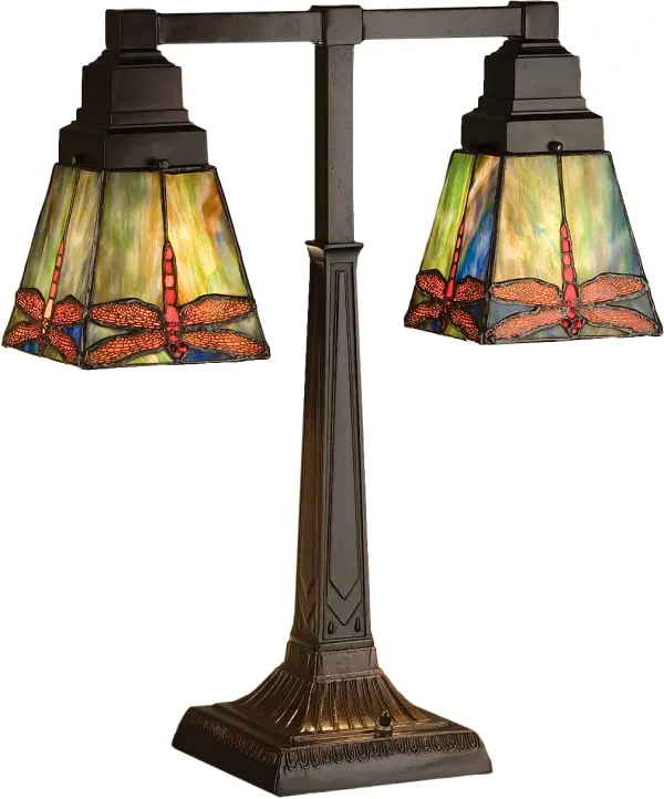 Scarlet Dragonflies with Ruby eyes dive downward against a cloud filled Aurora Midnight sky streaked with a full spectrum of colors. The exceptional stained art glass used in this family has unique tones in each piece; just as in nature. Each piece of glass is hand cut and copper foiled in the Tiffany tradition. The Mission style square shades are suspended from a complimentary two light table lamp base in a Mahogany Bronze finish.