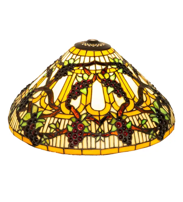 Bring sunny vineyards to your home or business with this lovely Meyda Original art glass shade. Radiant Concord Purple jewels; Vineyard Green leaves; and glistening dew-kissed Bark Brown vines wrap around this Golden Sunshine banded shade created using the famous Meyda Tiffany copperfoil construction process. Pair the shade with a base to create a beautiful table or floor lamp; or match it with hardware to create a ceiling fixture. The Jeweled Grape Shade is included in our American-designed; handcrafted Stained Glass Lighting Collection. Each shade is a unique work of art with color variations based on natural ingredients inherent in the glass. Please contact us if color matching is critical when ordering multiple items.