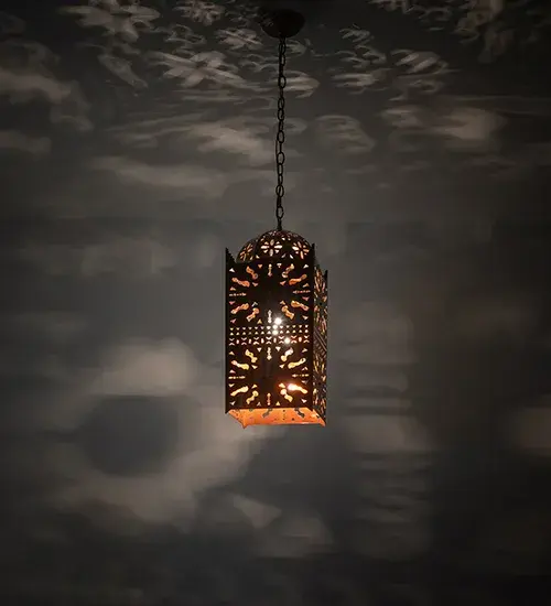 Blending an elegant style with a classic; distinguished look. The Moroccan Brass Pendant is custom-crafted with an intricate design with decorative accents hand-finished in Transparent Copper. Overall height ranges from 23.5 to 167.5 inches as the chain easily adjusts in the field. The mini pendant is ideal for illuminating bars; islands; counters; tables; and other residential; hospitality; and commercial spaces. Inspired by architecture in Casablanca; Rabat; and Marrakesh; Morocco; to Los Angeles; California. to The Moroccan Mini Pendant is featured in our American-made; American-designed; handcrafted Moroccan Lighting Collection and manufactured in Yorkville; New York. UL and cUL listed for dry and damp locations.