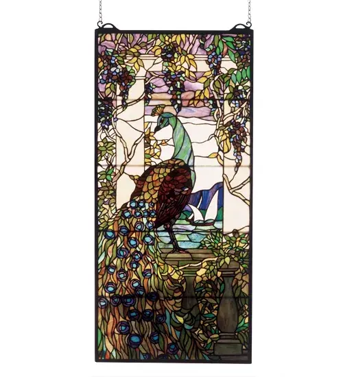 Lavish and beautiful; Meyda Tiffany's Peacock & Wisteria Window is a Louis C. Tiffany reproduction; a tribute to the colorful mastery that Tiffany achieved. Handcrafted utilizing the copperfoil construction process and 1;605 pieces of stained art glass encased in a solid brass frame; each window is a unique creation to be forever treasured. Mounting bracket and jack chain included.