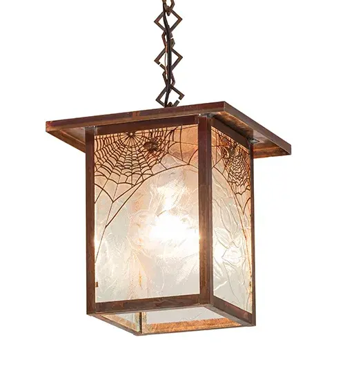 A Spider weaves it's magical web on the edge of this handsome American Craftsman lantern style ceiling pendant. The fixture, handcrafted in the USA by Meyda artisans, is finished in Vintage Copper and has Clear Leaf pattern glass panels. Collection: Hyde Park Finish: Vintage Copper Glass: Clear Seeded Glass Width: 12.75" Height: 13.00" Length: 9.00" Weight: 7.00 lb Extension from Wall: 4.00" Number of Bulbs: 1 Maximum Wattage: 60.00 W Bulb Type: A19 Bulb Base: E26 Material: Copper Country of Origin: USA Safety Listing: Damp Safety Rating: Damp - alternate view
