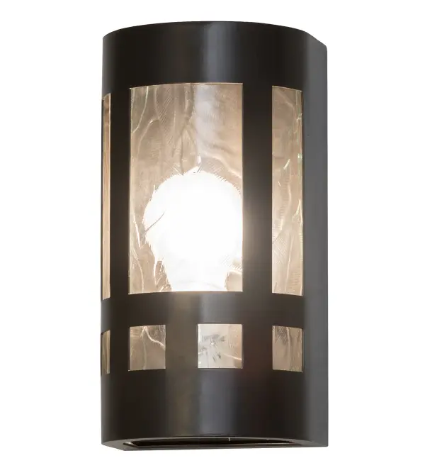 Created in the tradition of American master craftsmen, this uniquely designed wall sconce features a stunning Clear Leaf Glass lens set within a Timeless Bronze finished frame. The ADA-compliant fixture is ideal for illuminating hallways, entryways, and other spaces in residential and hospitality settings. The Sutter Wall Sconce is featured in our American-made, American-designed handcrafted Arts & Crafts Lighting Collection. UL and cUL listed for dry and damp locations. Collection: Sutter Finish: Timeless Bronze Glass: Clear Leaf Glass Notes: Custom Crafted In Yorkville, New York Please Allow 30 Days Width: 5.00" Height: 9.50" Length: 4.00" Weight: 3.50 lb Extension from Wall: 4.00" Number of Bulbs: 1 Maximum Wattage: 60.00 W Bulb Base: E26 Material: Steel Country of Origin: USA Safety Listing: Dry Safety Rating: Damp